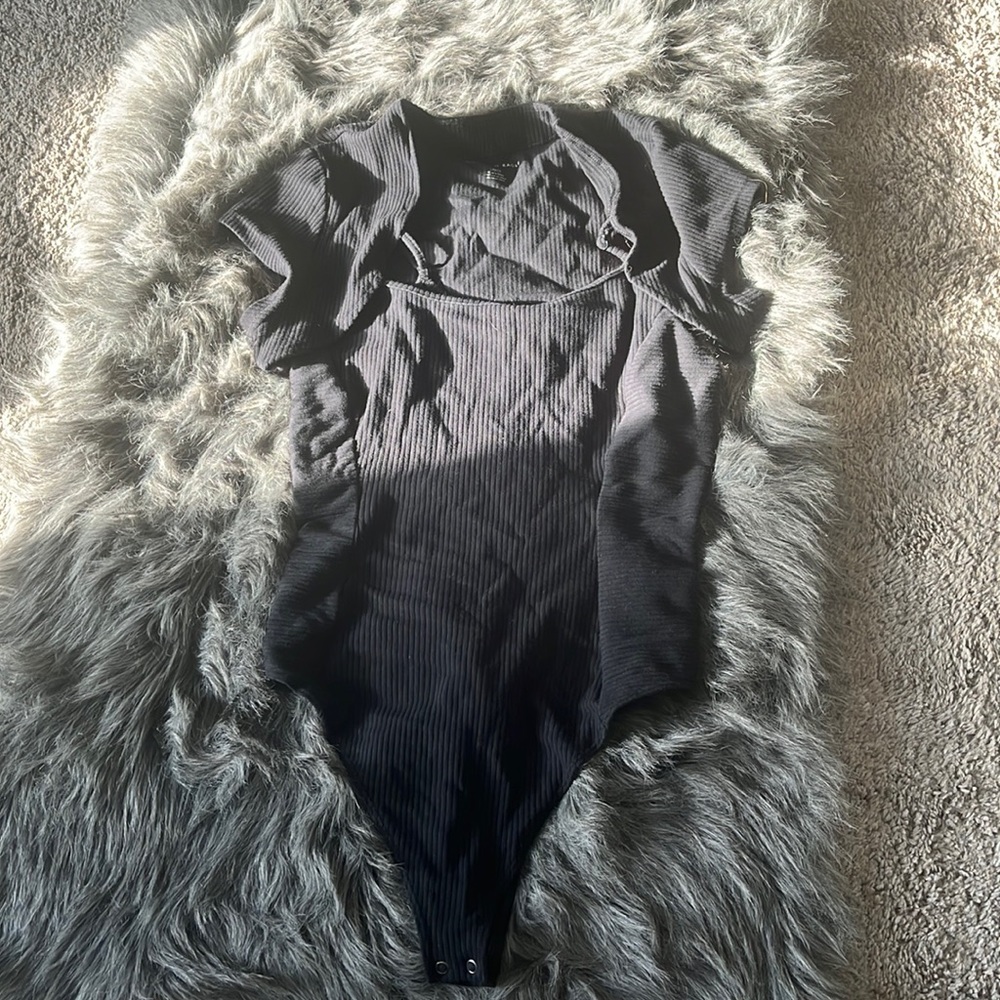 Black ribbed stretchy body suit with detachable short sleeves